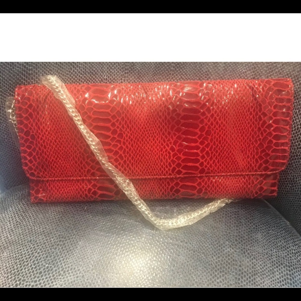 Carlos falchi red emborssed bag